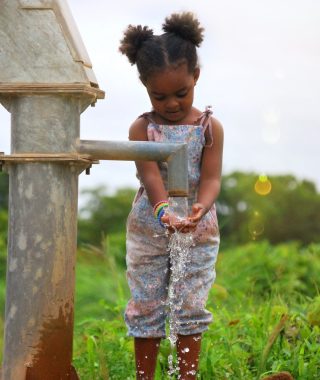 girl-washing-her-hands-at-a-water-well-in-burkina-faso-africa.jpg